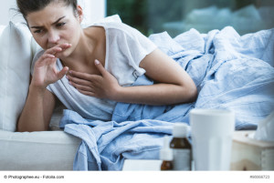 Picture of sick woman with cough and throat infection